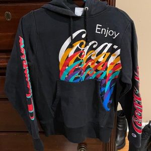 Men’s S champion hoodie.  Black with colorful accents.